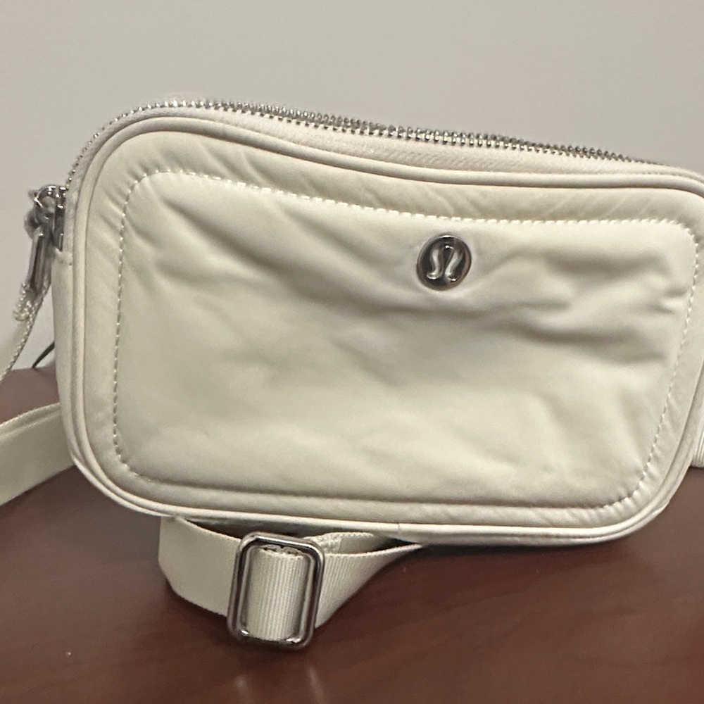lululemon white zip pouch with silver hardware